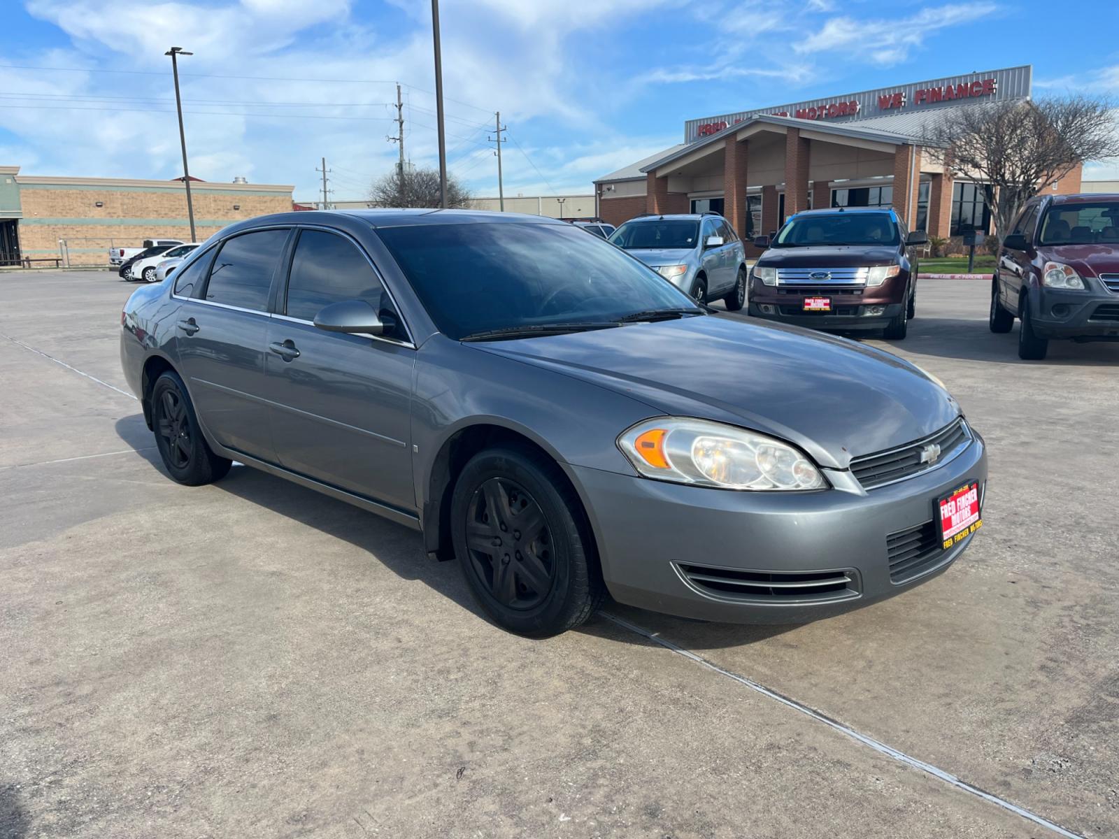 2007 GRAY /black Chevrolet Impala LS (2G1WB55KX79) with an 3.5L V6 OHV 16V FFV engine, 4-Speed Automatic Overdrive transmission, located at 14700 Tomball Parkway 249, Houston, TX, 77086, (281) 444-2200, 29.928619, -95.504074 - Photo #0
